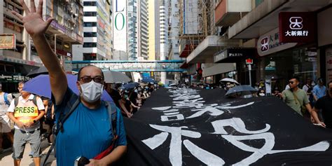 A Hong Kong language group shuts down after police allege one of its essays breached security laws